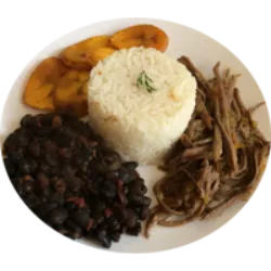 O Pabellón Criollo é um prato tradicional venezuelano, considerado o prato nacional, que incorpora influências das culturas indígena, espanhola e africana da época colonial. Composto por arroz, carne desfiada em guisado e feijão preto cozido, o prato possui variações, como adições de tajadas (banana frita) ou ovo frito, cada uma recebendo designações específicas. Além disso, as pessoas podem personalizar o prato com ingredientes como açúcar no feijão, queijo palmita ou molho picante. A carne desfiada pode ser substituída por chigüire, carne de jacaré ou peixe de água doce, dependendo de preferências regionais, época do ano ou gosto pessoal.