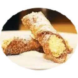 O Cannoli é uma sobremesa italiana em formato de tubo que consiste numa massa recheada com ricota doce, frutas cristalizadas ou chocolate em gotas, originária de Caltanissetta ou regiões próximas, entre os anos 827 e 1091. Existem duas histórias sobre sua origem: uma relacionada ao harém de um príncipe árabe, onde concubinas buscavam exaltar a masculinidade do emir, e outra ligada a um convento fora do castelo, onde freiras elaboravam a massa para celebrar o Carnevale antes da Quaresma. 